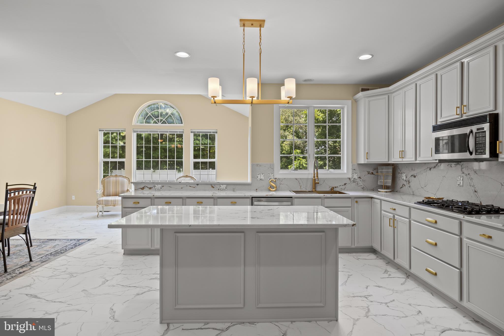 54 Jasmine Road Lumberton, NJ 08048 - Photo 12 of 60 a kitchen with stainless steel appliances granite countertop a stove a sink and a refrigerator