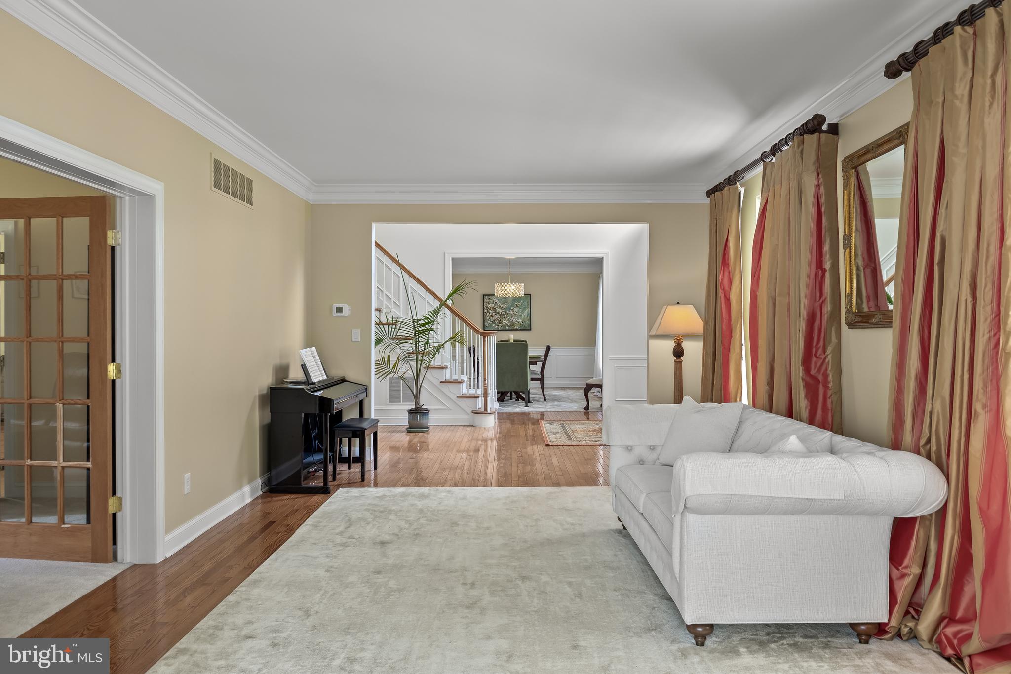 54 Jasmine Road Lumberton, NJ 08048 - Photo 17 of 60 a living room with a large window and a wooden floor