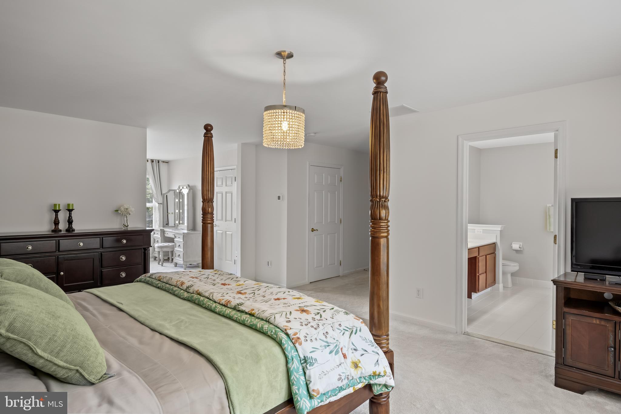 54 Jasmine Road Lumberton, NJ 08048 - Photo 32 of 60 a bedroom with a bed and a flat screen tv