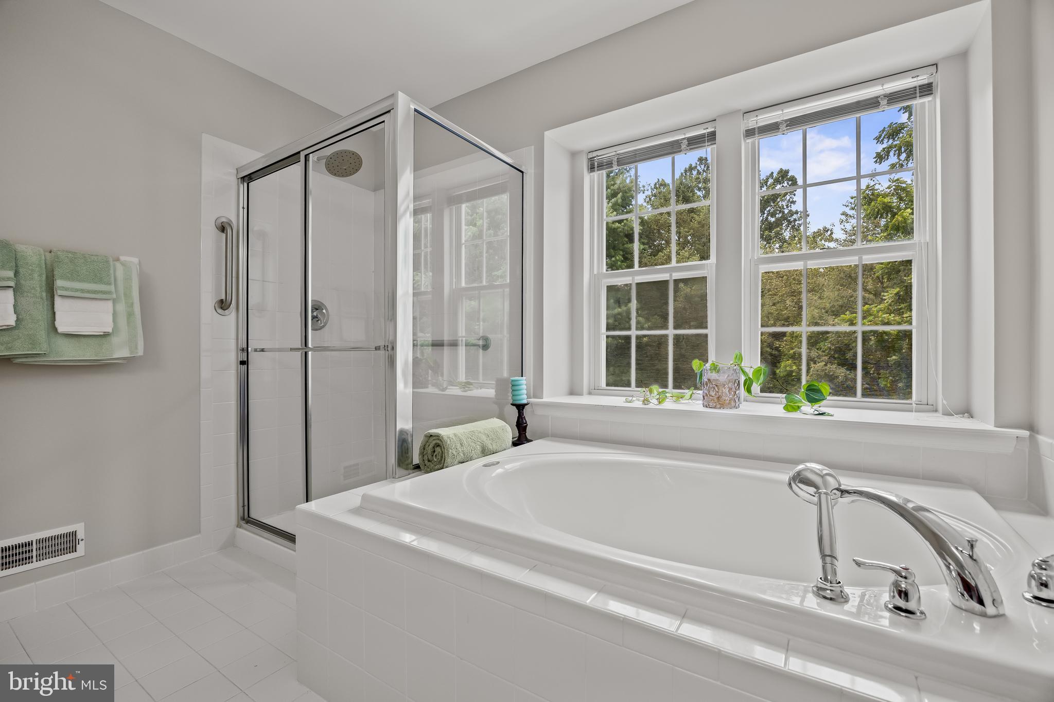 54 Jasmine Road Lumberton, NJ 08048 - Photo 36 of 60 a spacious bathroom with a tub and a sink