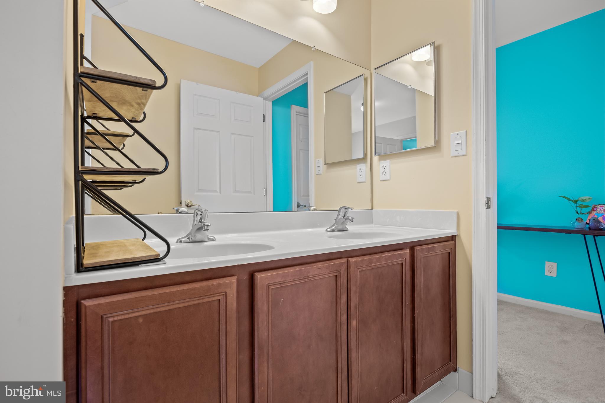54 Jasmine Road Lumberton, NJ 08048 - Photo 44 of 60 a bathroom with a granite countertop sink and a mirror