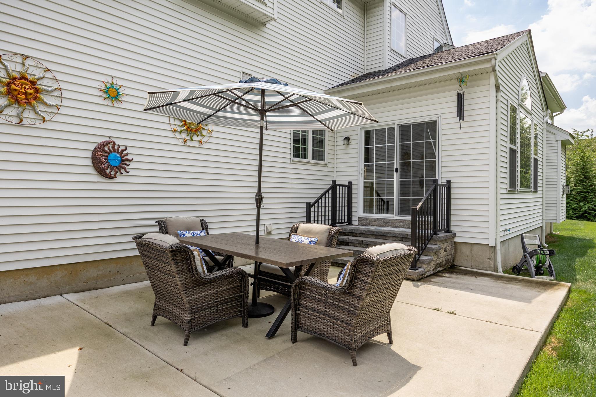 54 Jasmine Road Lumberton, NJ 08048 - Photo 51 of 60 a backyard of a house with table and chairs