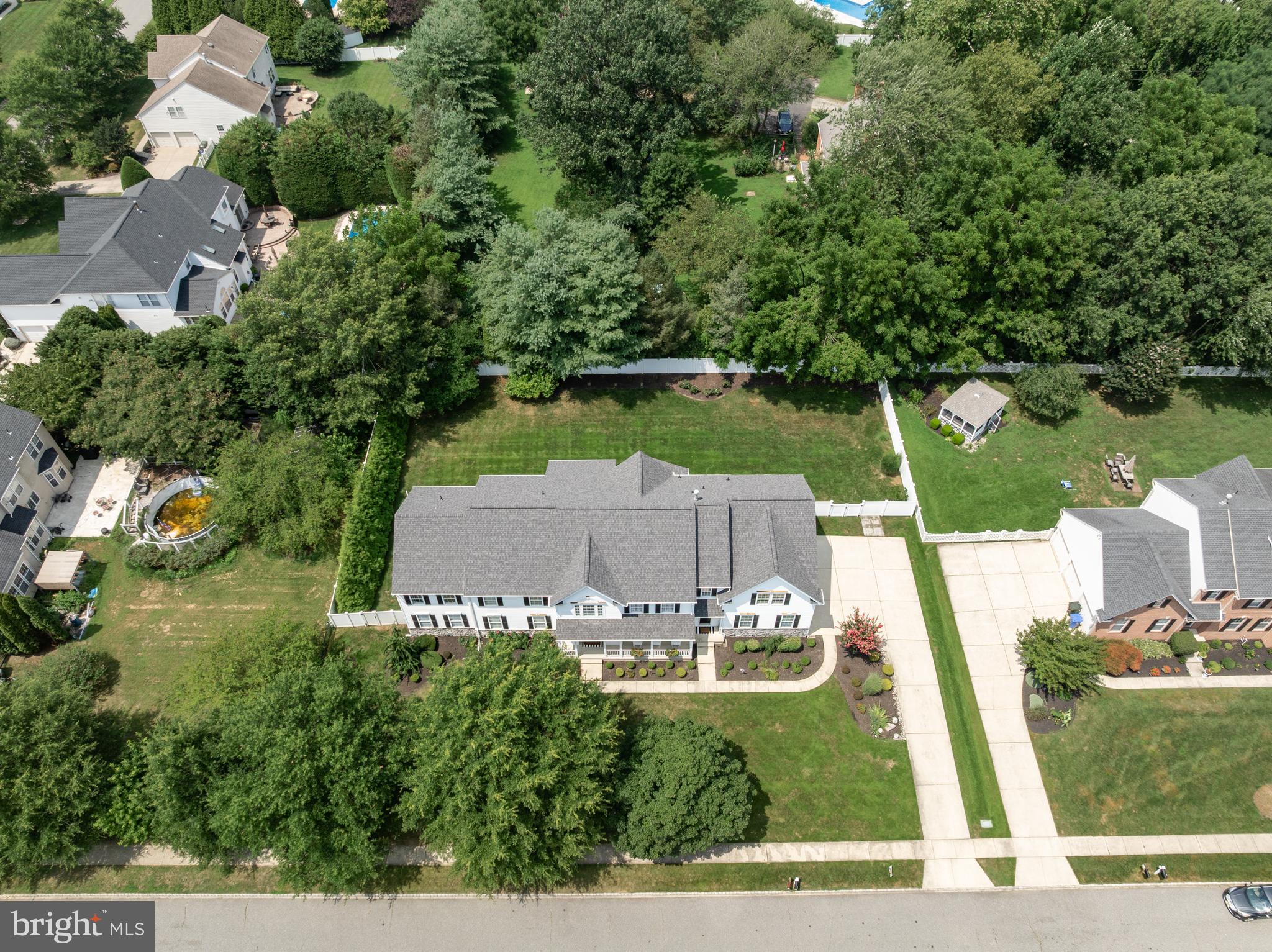 54 Jasmine Road Lumberton, NJ 08048 - Photo 53 of 60 an aerial view of a house with garden space lake view and trees all around