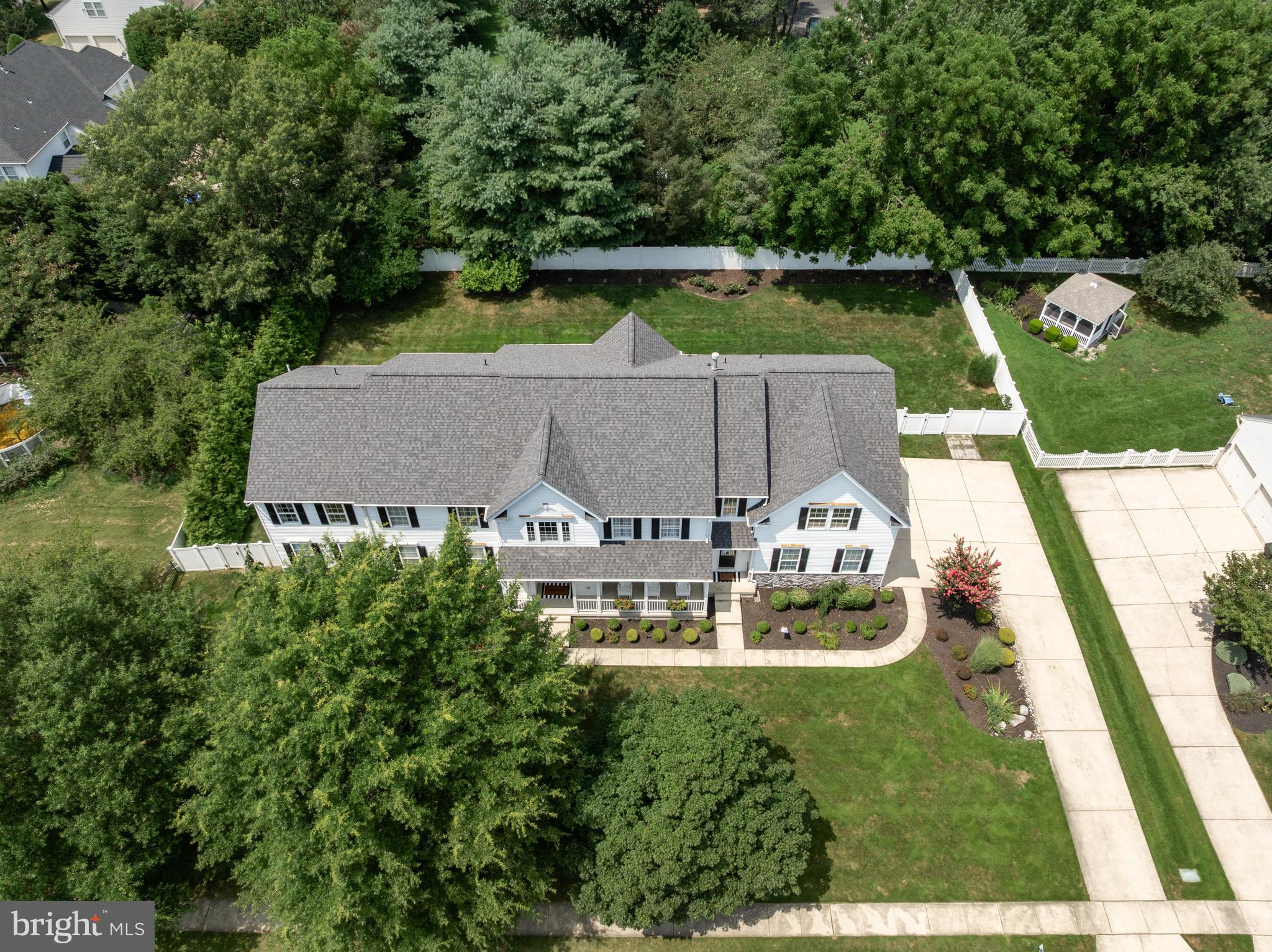 54 Jasmine Road Lumberton, NJ 08048 - Photo 54 of 60 an aerial view of a house with swimming pool a yard and a large tree