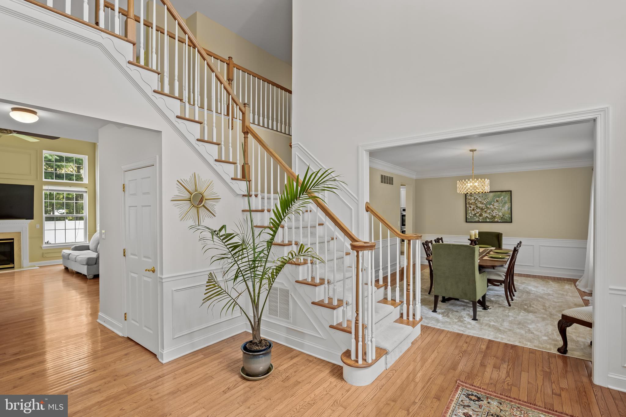 54 Jasmine Road Lumberton, NJ 08048 - Photo 8 of 60 a view of entryway dining room and hall with wooden floor