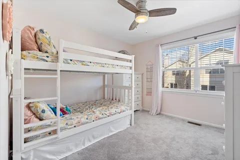 a picture of a bench in front of a wall