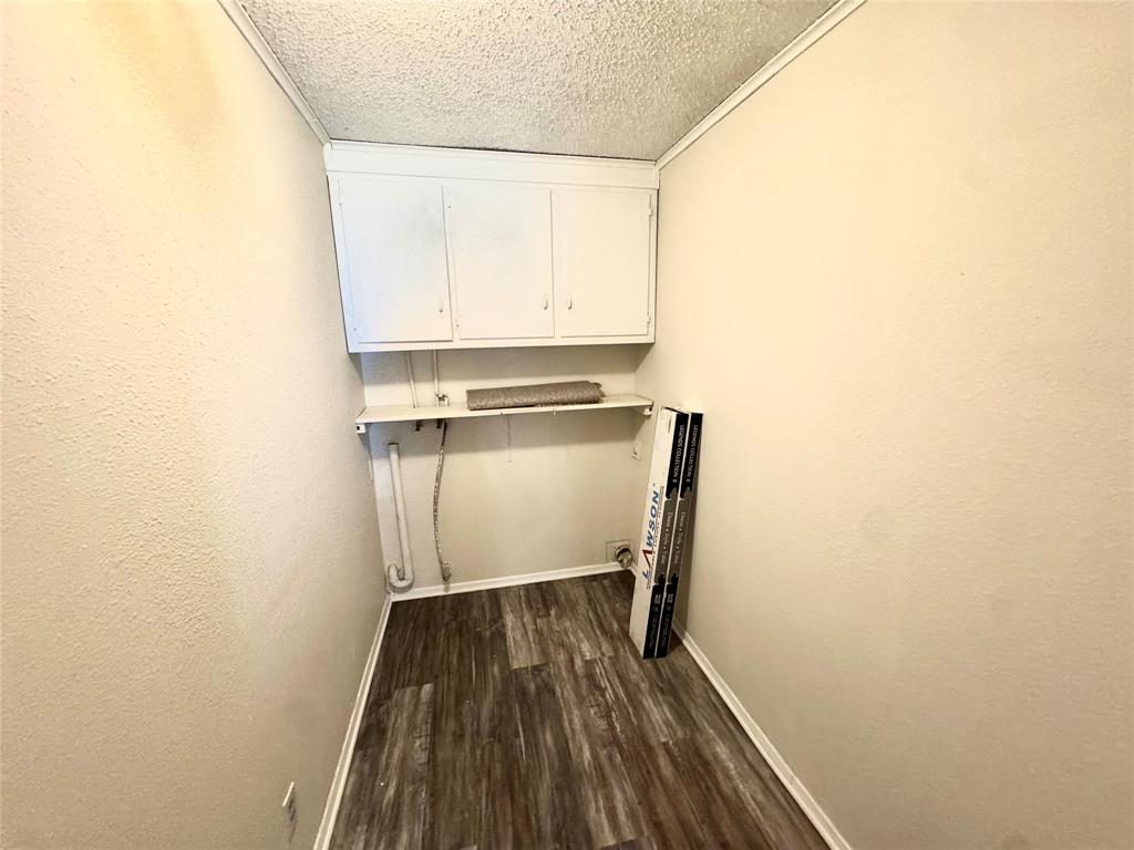 249 County Road 1150 Bonham, TX 75418 - Photo 13 of 28 a view of a room with wooden floor and small space