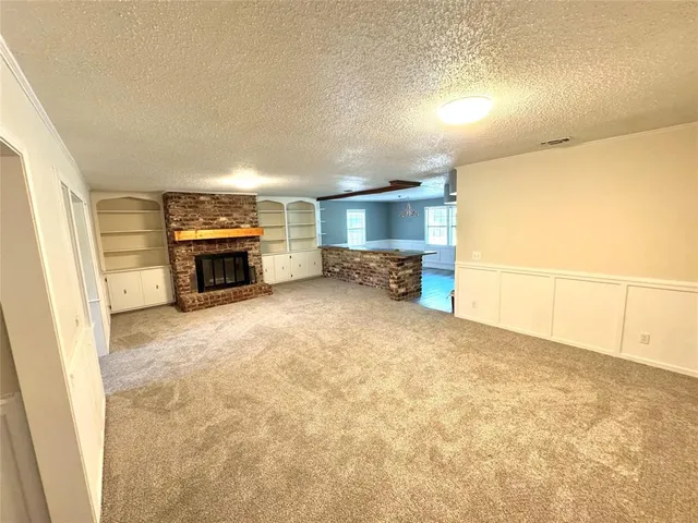 a view of livingroom with furniture and stove