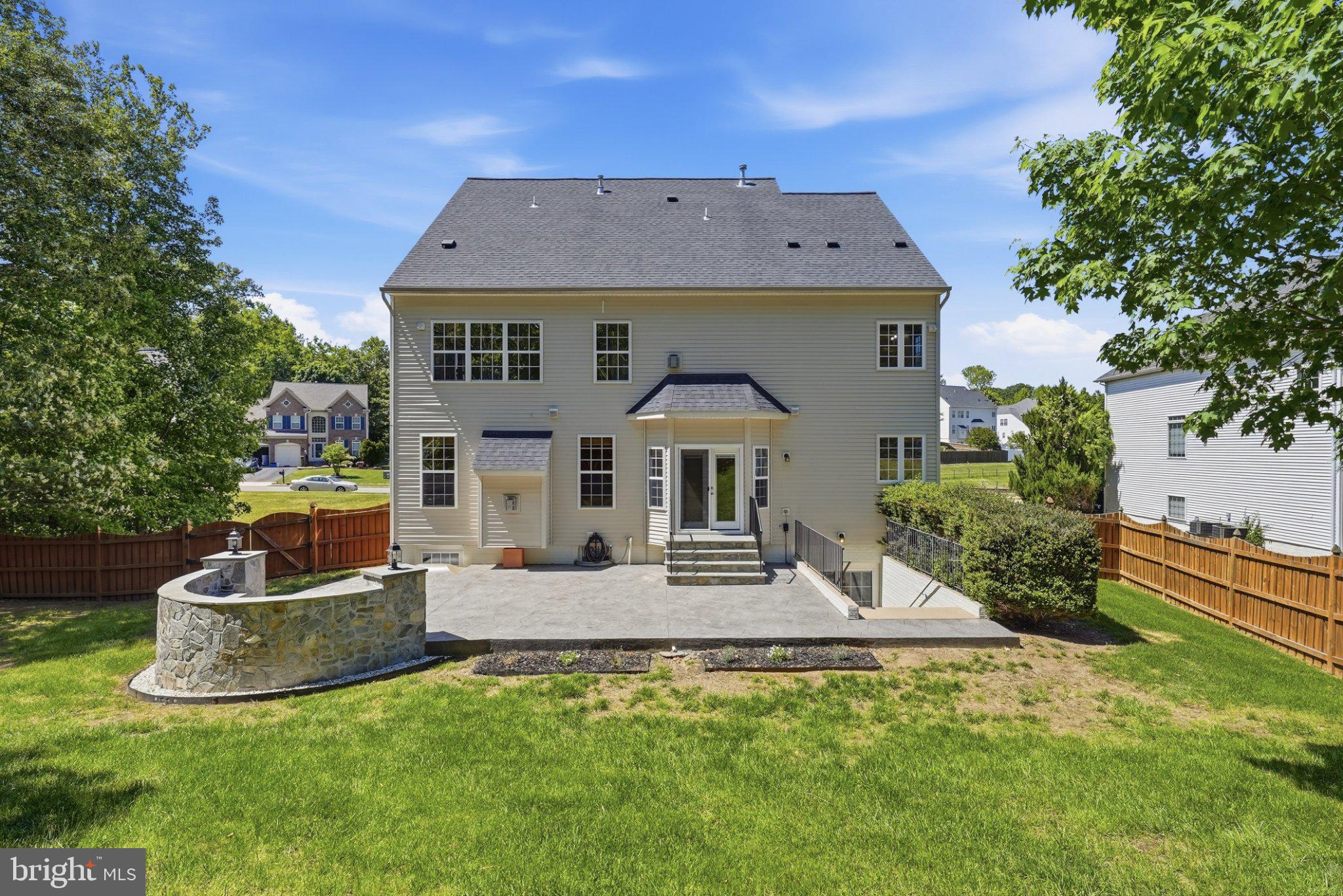 3679 Expedition Drive Triangle, VA 22172 - Photo 55 of 65 a aerial view of a house with a yard table and chairs