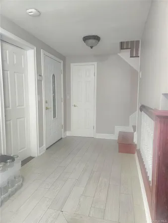 a view of entryway with stairs