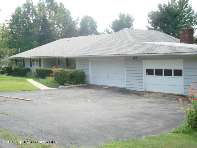 339 Maple Lake Road Moscow, PA 18444 - Photo 1 of 21 a backyard of a house