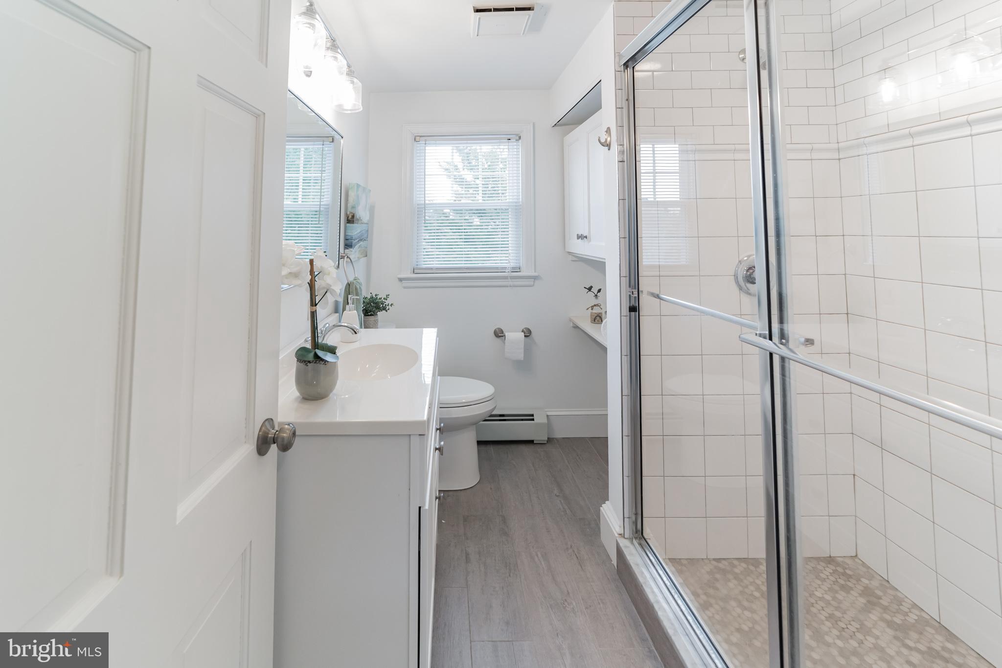 2088 Dutton Mill Road Newtown Square, PA 19073 - Photo 13 of 25 New Bath w/subway tiled shower and custom vanity.
