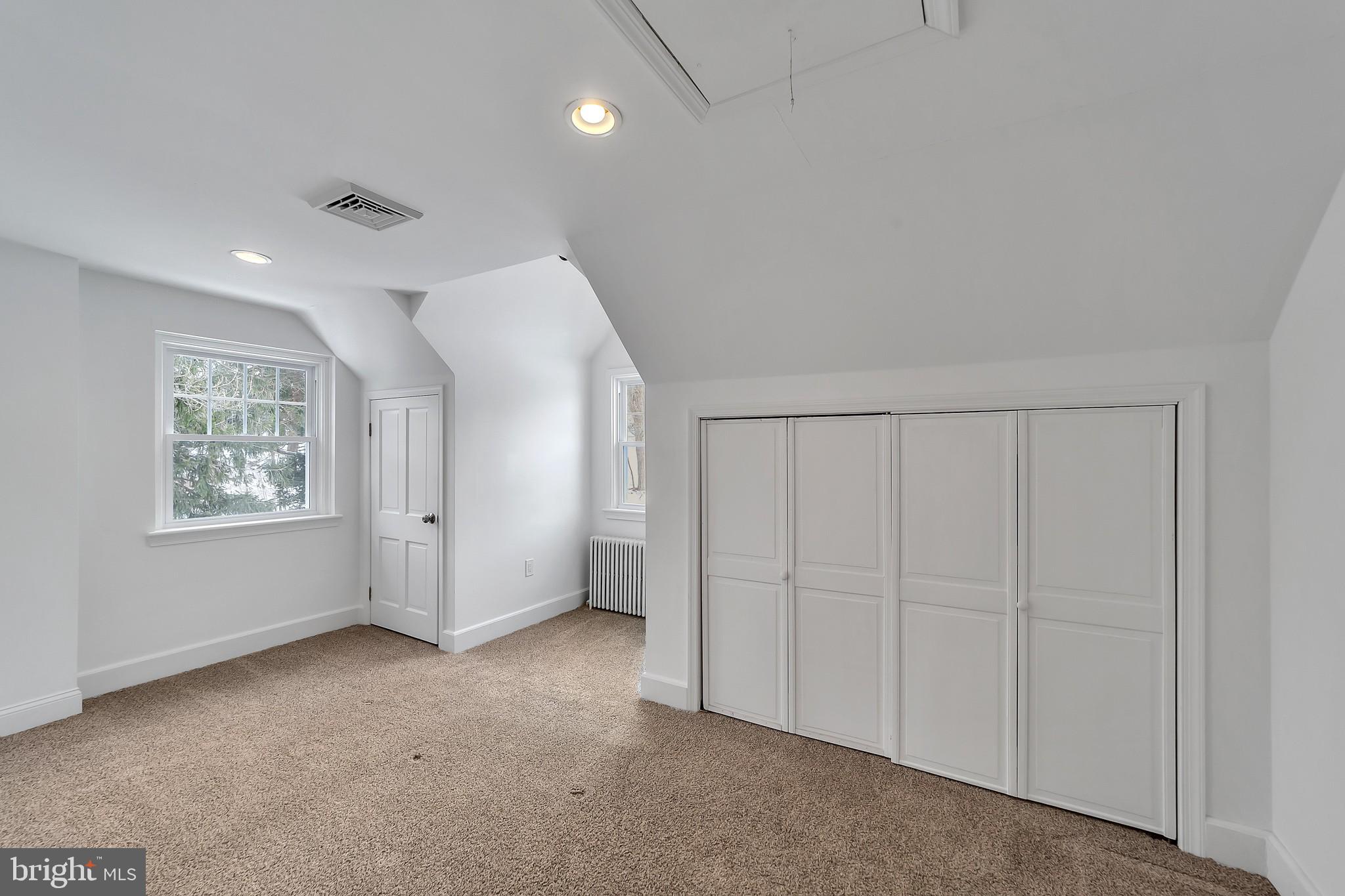 2088 Dutton Mill Road Newtown Square, PA 19073 - Photo 17 of 25 Bedroom 2 with recessed lighting and two closets.