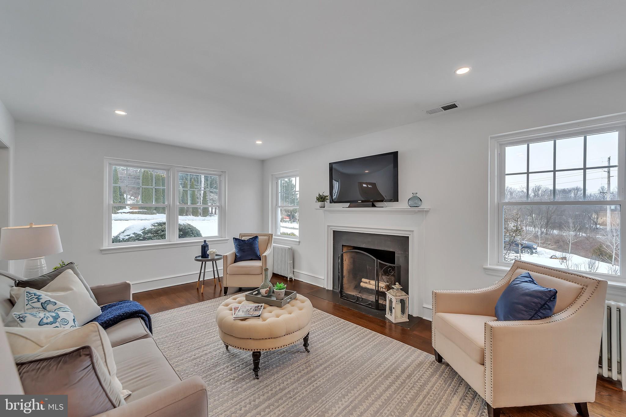2088 Dutton Mill Road Newtown Square, PA 19073 - Photo 6 of 25 Woodburning fireplace and mantel with power for tv