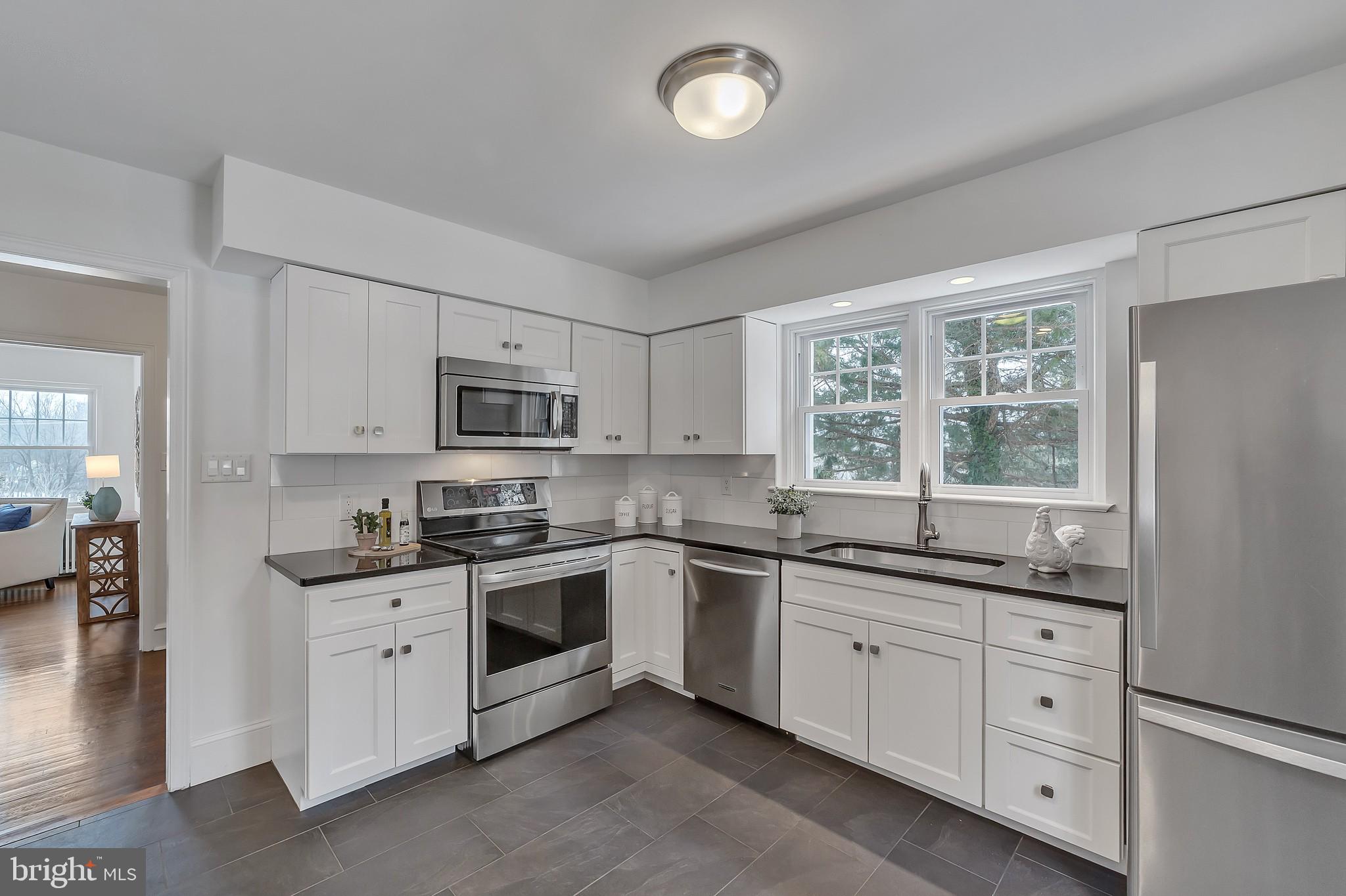 2088 Dutton Mill Road Newtown Square, PA 19073 - Photo 10 of 25 Granite Counters and new white cabinetry!