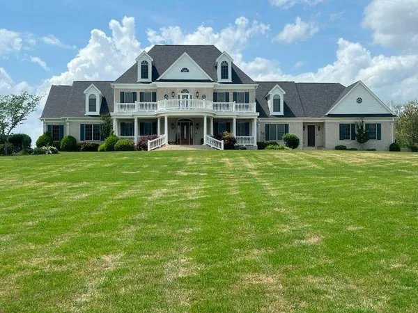 front view of a house with a garden