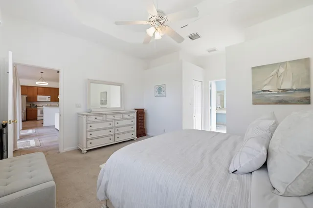 a bedroom with a bed and a couch