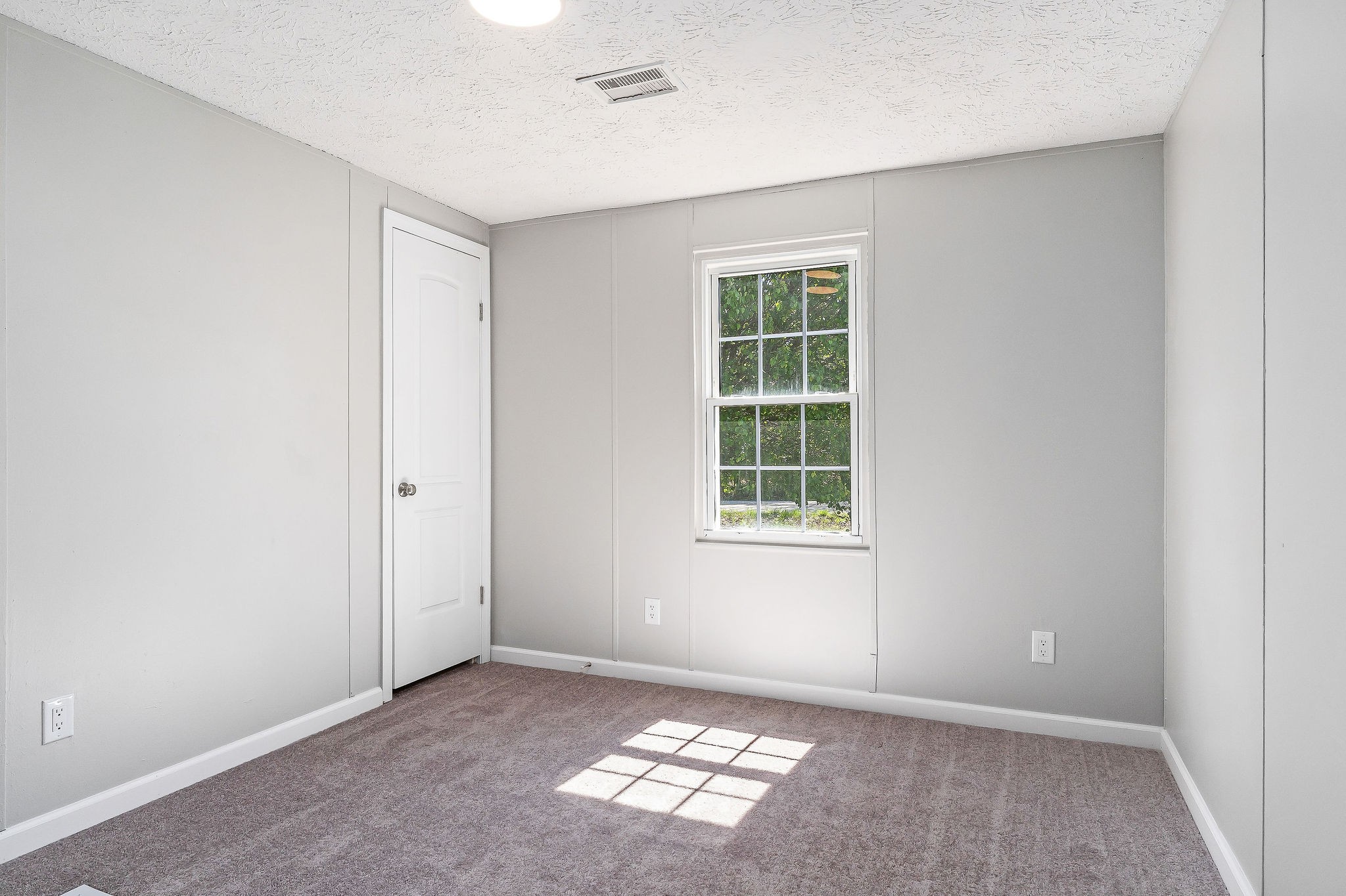 689 Capshaw Road Smithville, TN 37166 - Photo 16 of 29 an empty room with windows