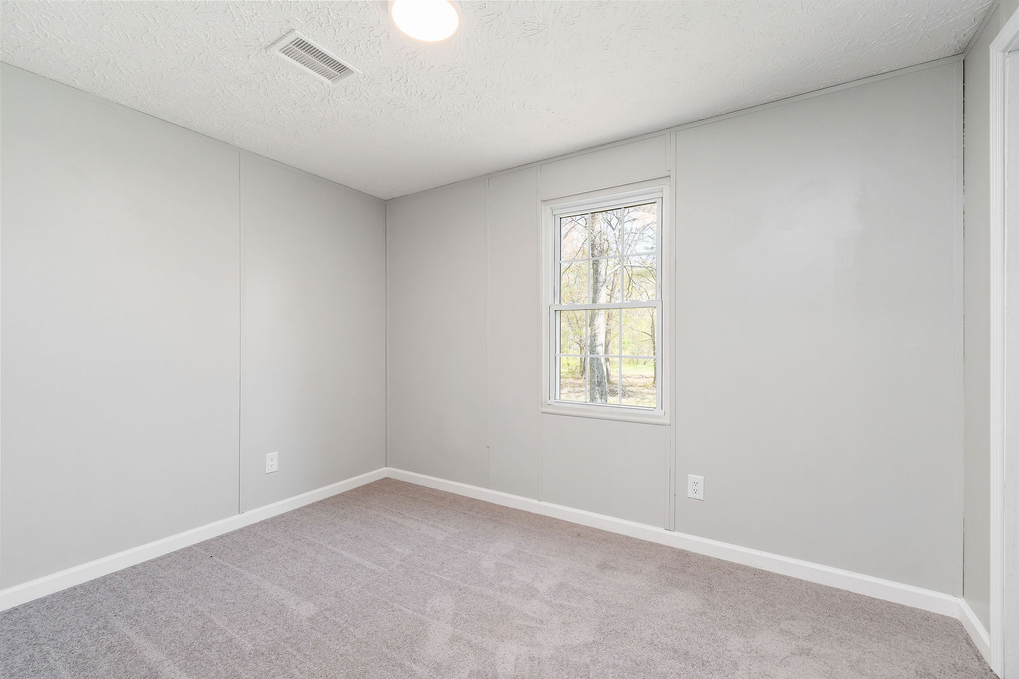 689 Capshaw Road Smithville, TN 37166 - Photo 19 of 29 an empty room with a window