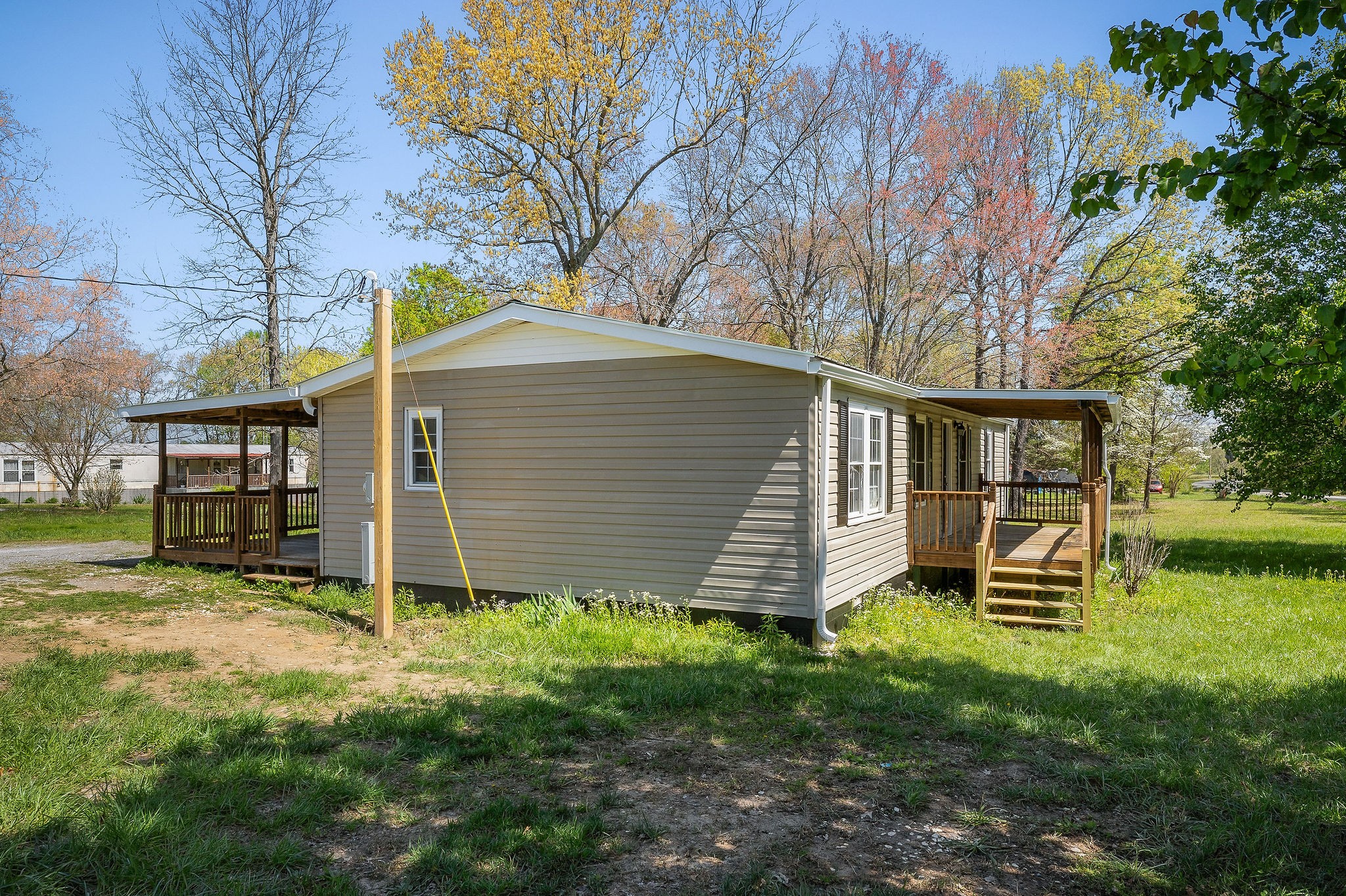 689 Capshaw Road Smithville, TN 37166 - Photo 22 of 29 front view of a house with a yard