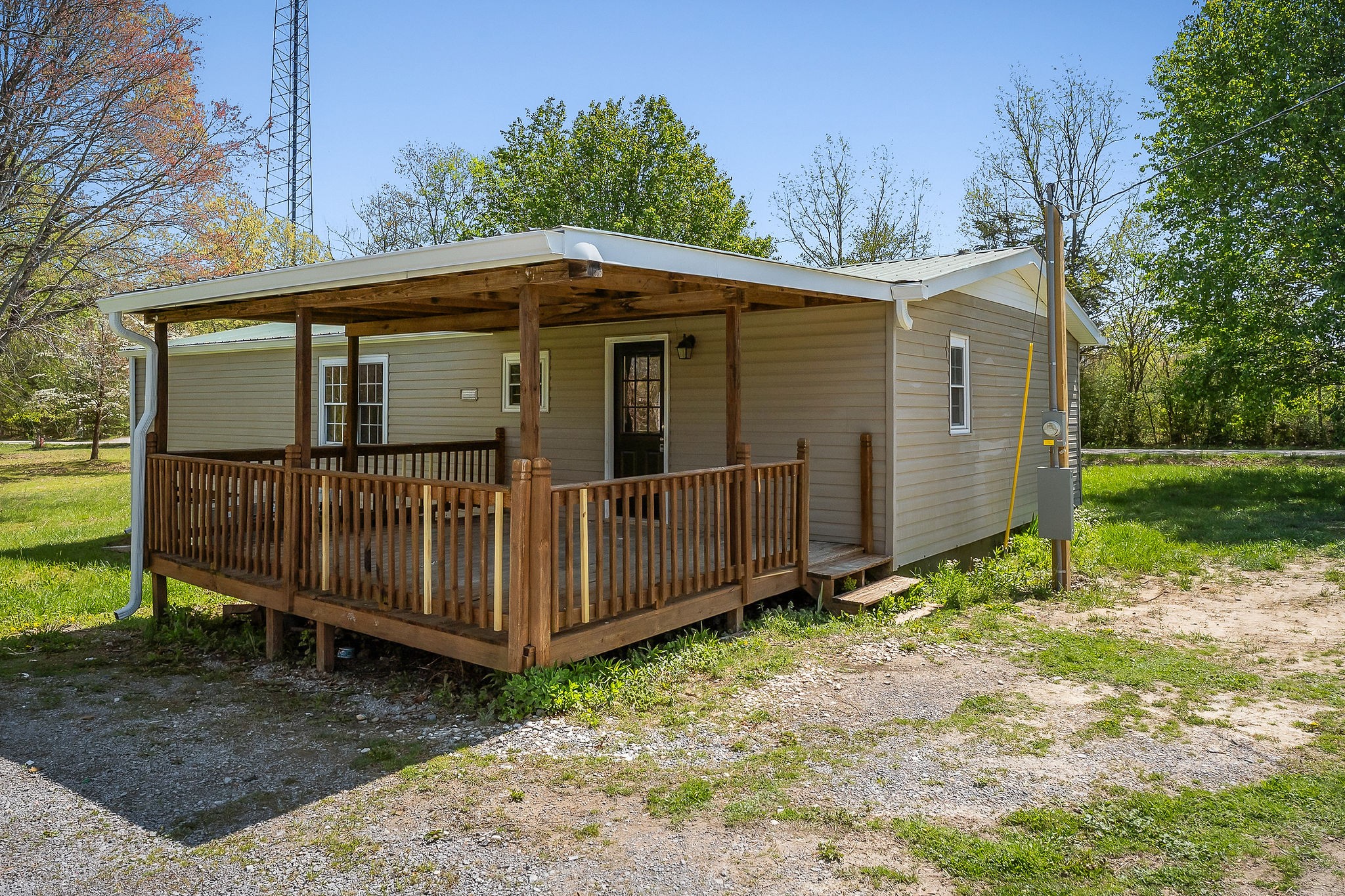 689 Capshaw Road Smithville, TN 37166 - Photo 26 of 29 a view of a house with a yard