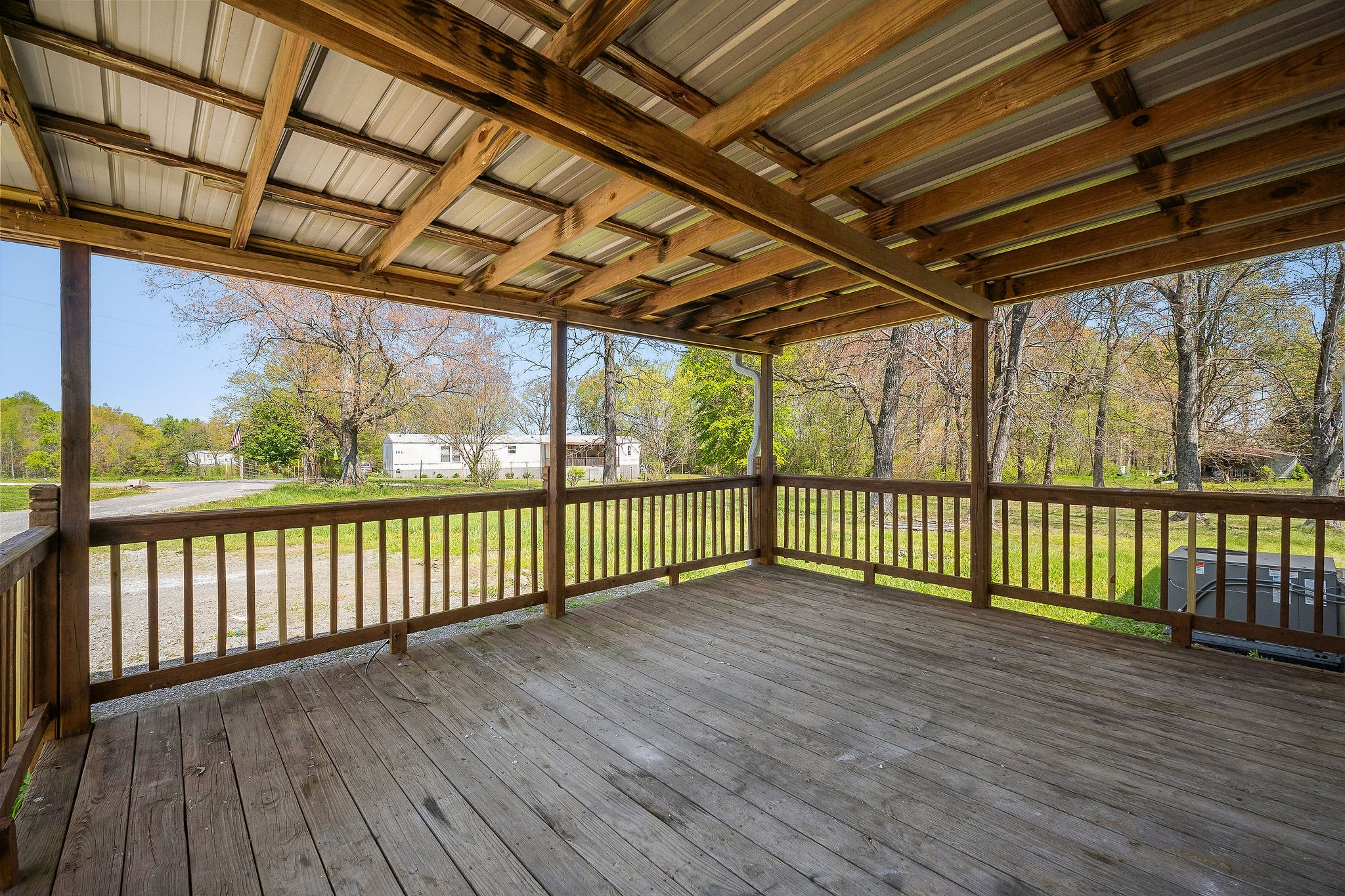 689 Capshaw Road Smithville, TN 37166 - Photo 28 of 29 a view of a porch with wooden floor