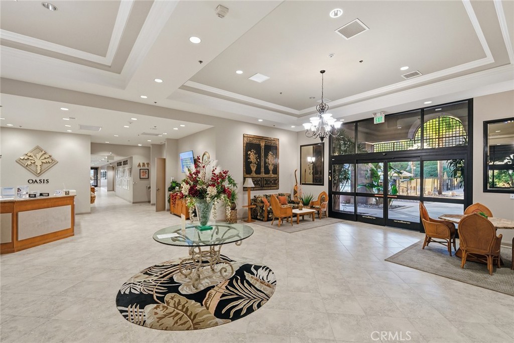 28920 Raintree Drive Menifee, CA 92584 - Photo 12 of 51 a room with furniture or chandelier and a large window