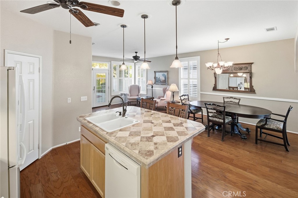 28920 Raintree Drive Menifee, CA 92584 - Photo 23 of 51 a very nice looking dining room with a table and chairs