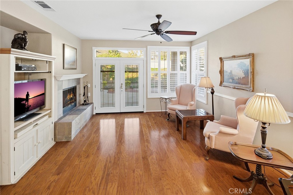 28920 Raintree Drive Menifee, CA 92584 - Photo 24 of 51 a living room with furniture and a fireplace