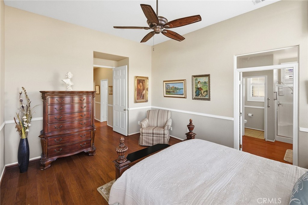 28920 Raintree Drive Menifee, CA 92584 - Photo 32 of 51 a bedroom with bed and window