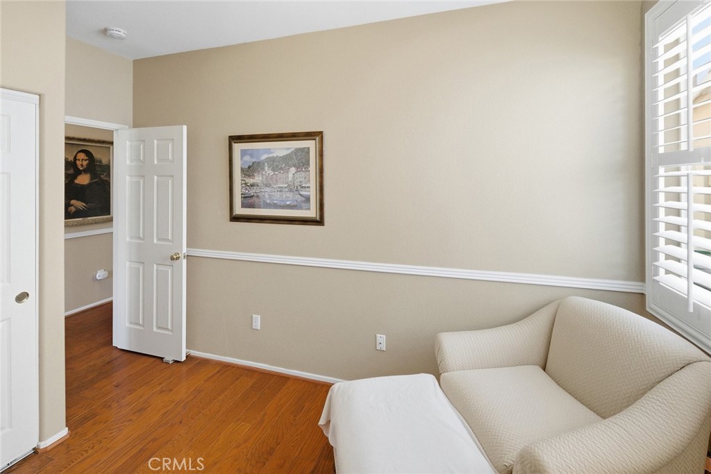 28920 Raintree Drive Menifee, CA 92584 - Photo 39 of 51 a bedroom with a bed and a window