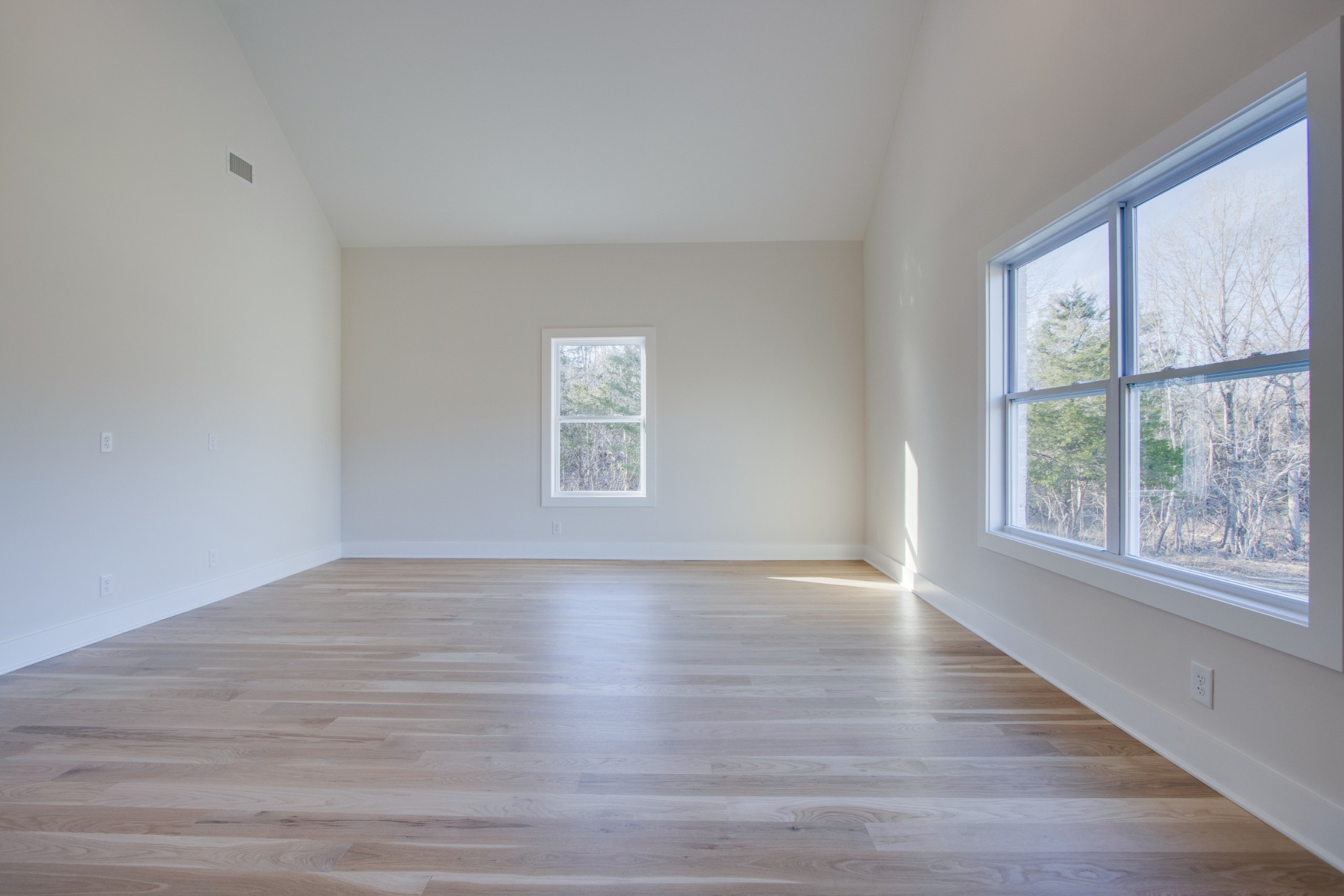2520 Callis Road Lebanon, TN 37090 - Photo 54 of 63 a view of an empty room with wooden floor and a window