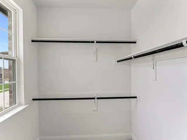 a view of a refrigerator in kitchen