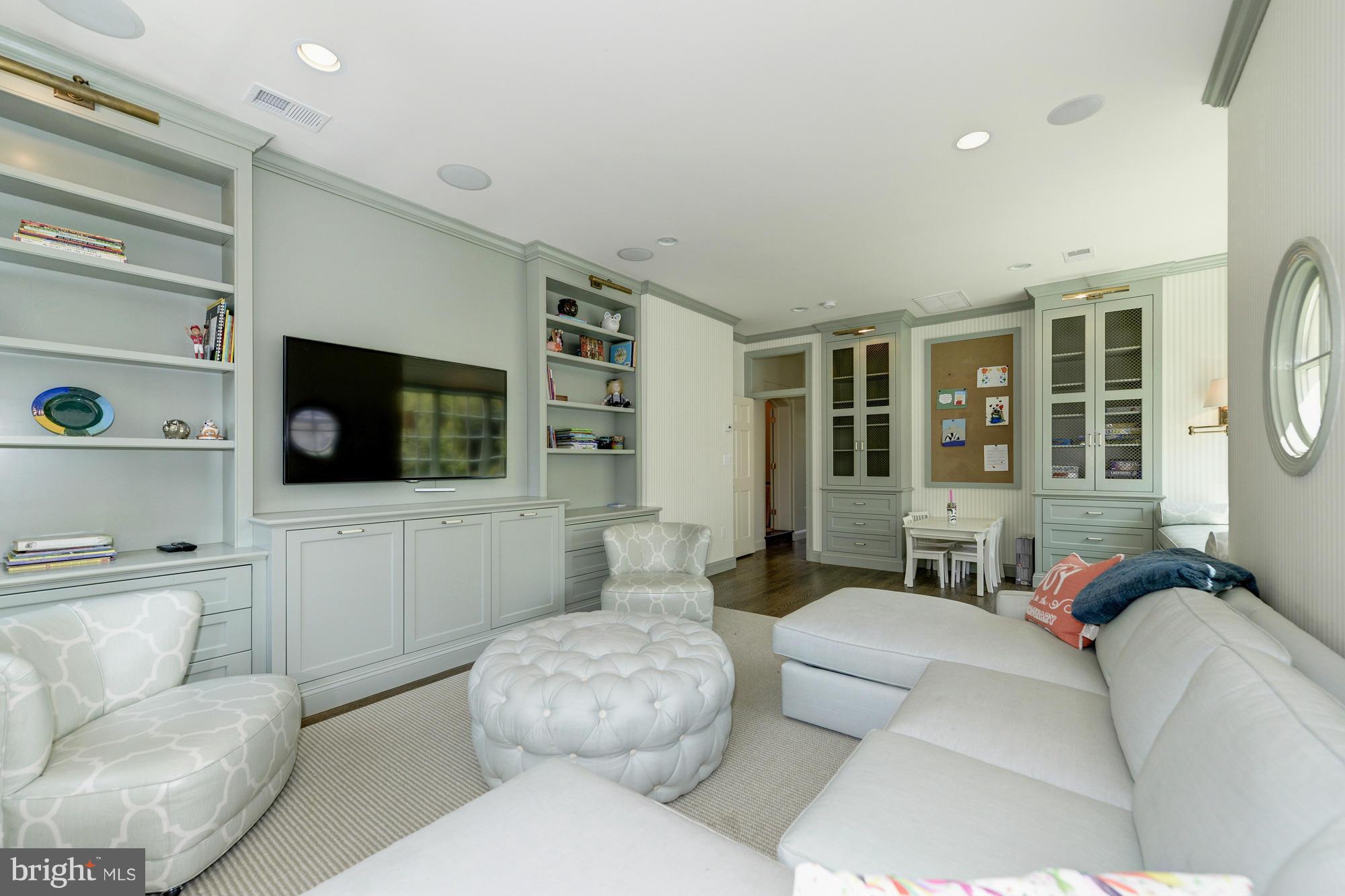 2206 Windsor Road Alexandria, VA 22307 - Photo 23 of 30 a living room with furniture and a flat screen tv
