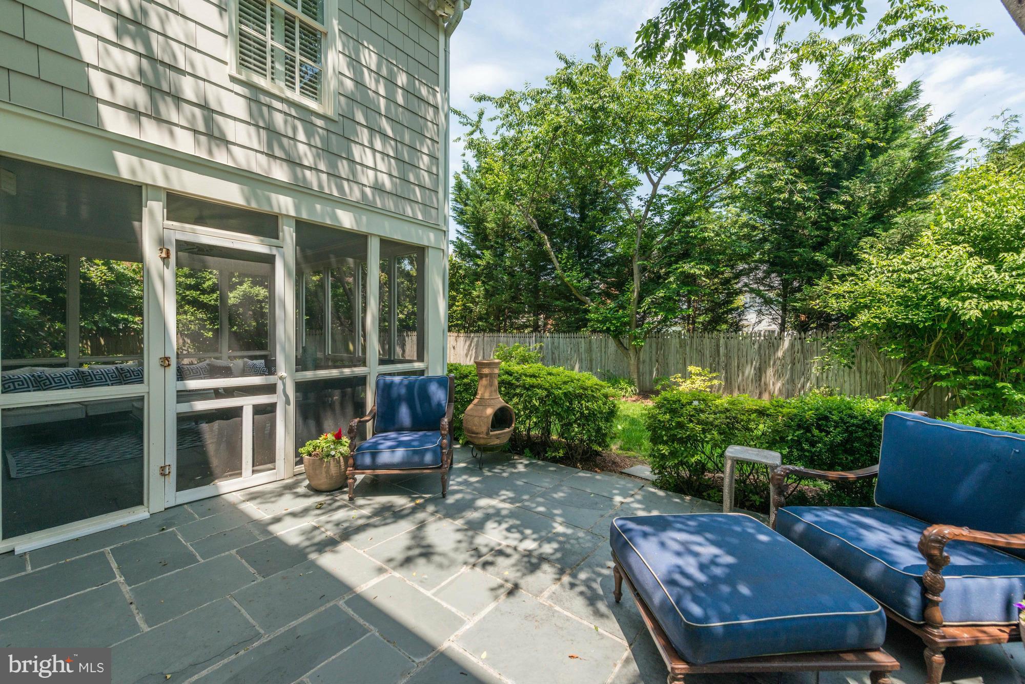 2206 Windsor Road Alexandria, VA 22307 - Photo 30 of 30 a view of a chairs and table in the back yard of the house