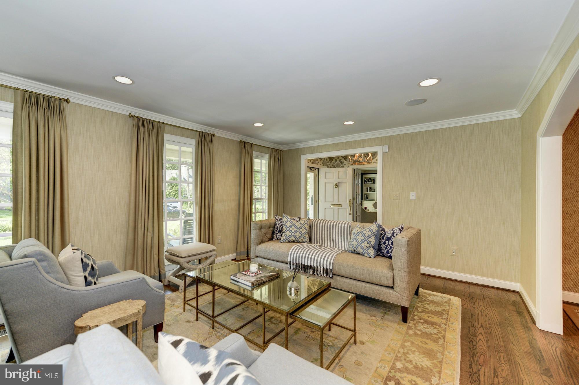 2206 Windsor Road Alexandria, VA 22307 - Photo 4 of 30 a living room with furniture and large windows