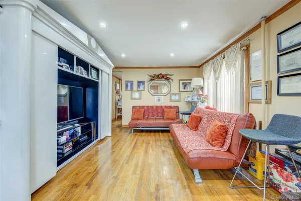 a living room with furniture and a rug