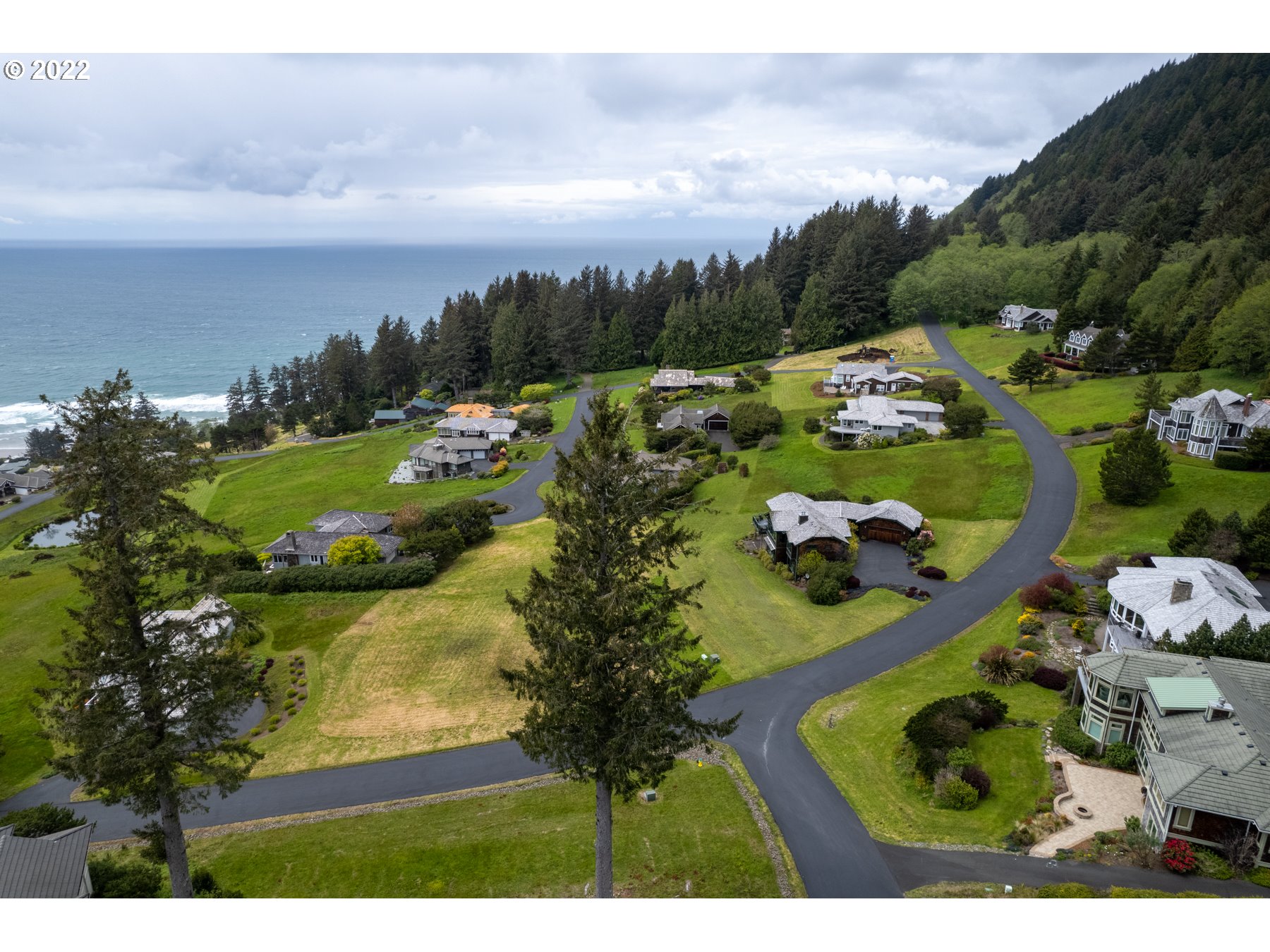 Braeridge Drive, Unit 10 Nehalem, OR 97131 - Photo 23 of 26 a view of a swimming pool and lake view