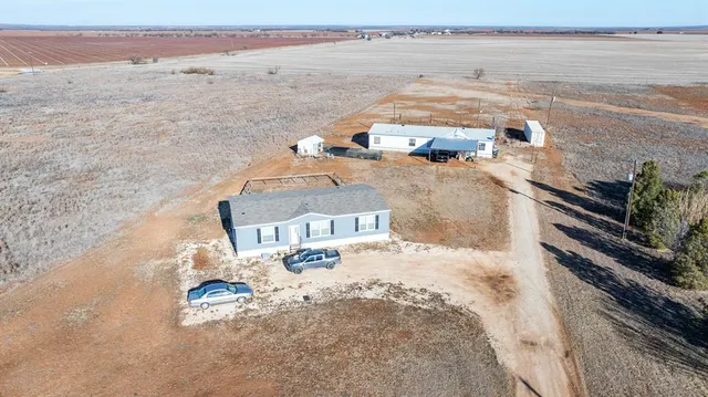a view of a city and ocean