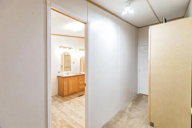 a work room with furniture and a window