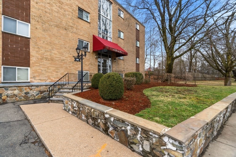 135 Granite Avenue, Unit 49 Boston, MA 02124 - Photo 13 of 14 a view of a house with brick walls