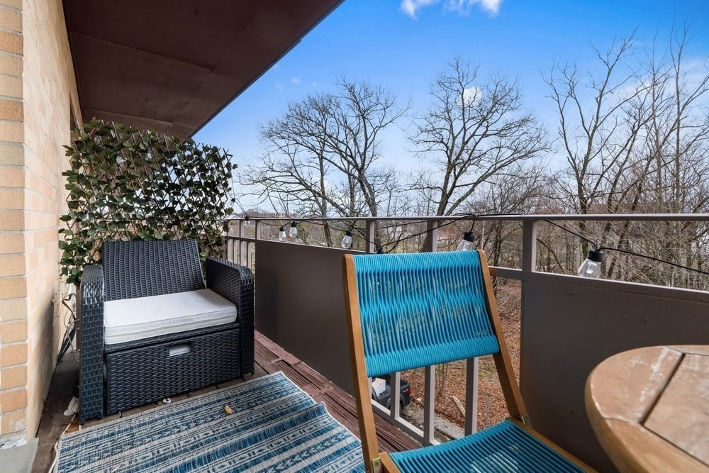 135 Granite Avenue, Unit 49 Boston, MA 02124 - Photo 10 of 14 a view of a couches in the roof deck