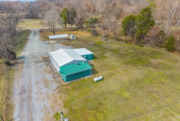 a view of yard with swimming pool