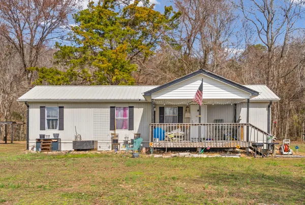 a view of outdoor space with wooden deck and entertaining space