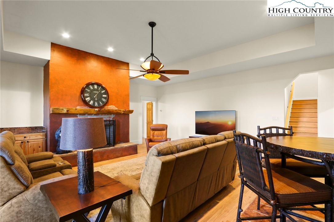 110 Pinnacle Ridge Road Beech Mountain, NC 28604 - Photo 30 of 49 a living room with furniture and a flat screen tv