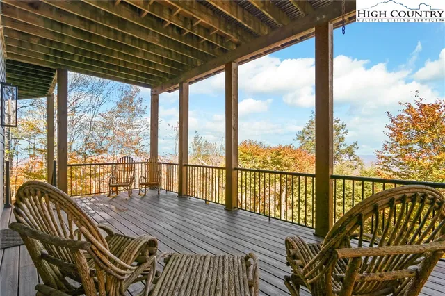 a view of balcony with wooden floor