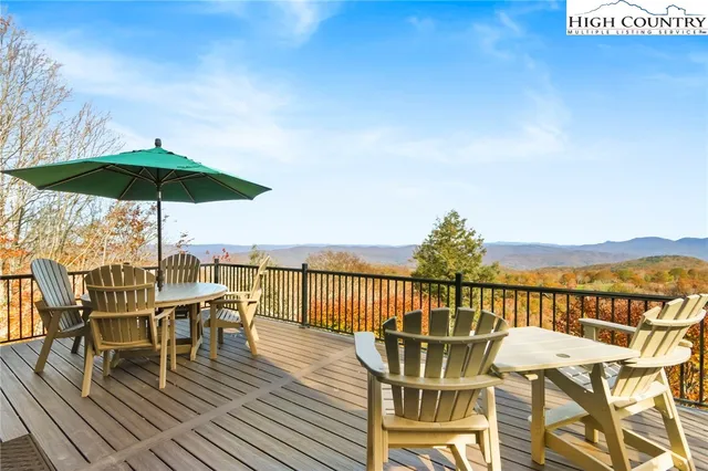 a view of a chairs and table on the wooden floor