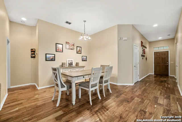 a view of a dining room with furniture