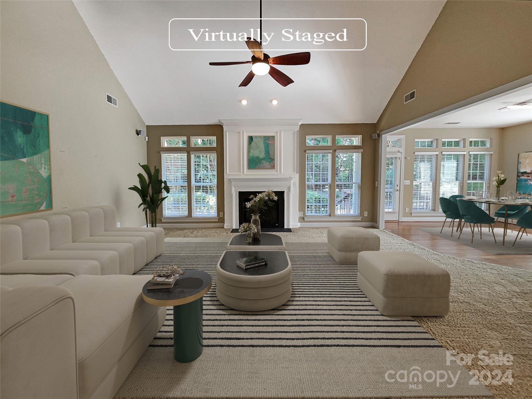 604 Panthers Way Fort Mill, SC 29708 - Photo 2 of 24 a living room with furniture a fireplace and a large window
