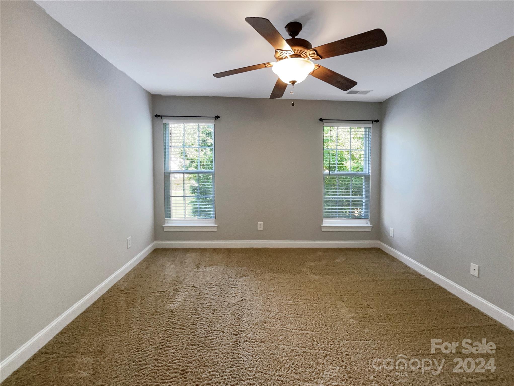 604 Panthers Way Fort Mill, SC 29708 - Photo 9 of 24 a view of an empty room with a window